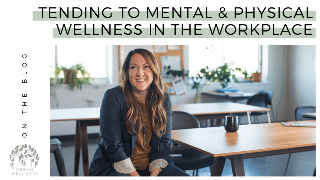 A graphic that reads "On the blog: Tending to Mental & Physical Wellness in the Workplace" Above a stock photo of a white woman in a blazer sitting at a desk