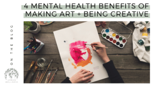 A graphic that reads "4 Mental Health Benefits of Making Art + Being Creative" above a stock photo of a person's hands painting a watercolor picture, with painting supplies on the table around them. We can only see their hands and the table from above.