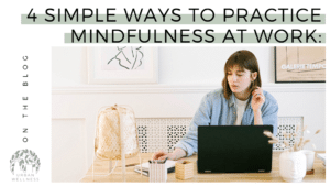 A graphic that reads "4 Simple Ways to Practice Mindfulness at Work" above a stock photo of a white woman sitting at a desk in what looks like a home office.